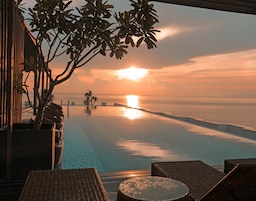 Outdoor pool, open 6 AM to 10:00 PM, pool umbrellas, sun loungers