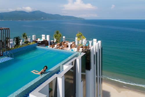 Outdoor pool, open 6 AM to 10:00 PM, pool umbrellas, pool loungers