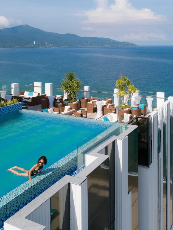 Outdoor pool, open 6 AM to 10:00 PM, pool umbrellas, sun loungers