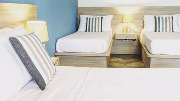 Minibar, desk, bed sheets