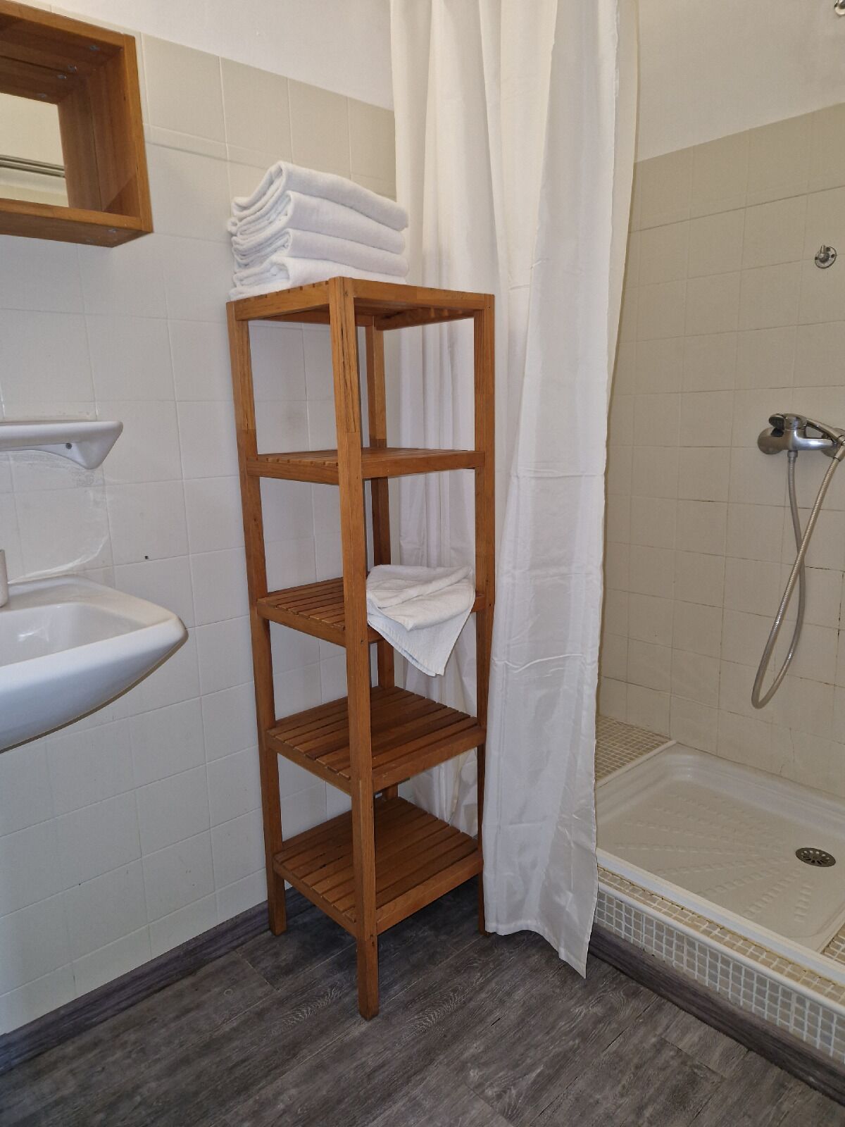 comfort room, garden view | bathroom | shower, free toiletries, hair dryer, towels