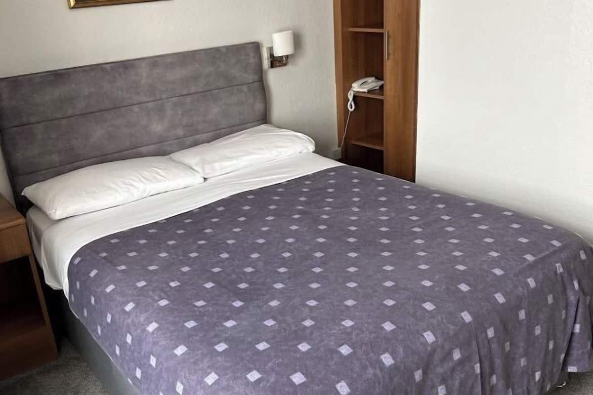 Blackout curtains, iron/ironing board, free WiFi, bed sheets