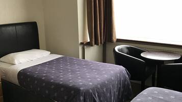 Twin Room | Blackout drapes, iron/ironing board, free WiFi, bed sheets