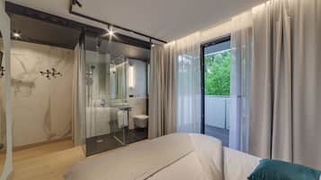 Kamar Double Deluks | Area keluarga | Smart TV 52-inci dengan saluran TV kabel, TV, dan lantai berpemanas