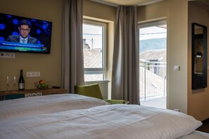 Hypoallergeen beddengoed, een kluis op de kamer, een bureau