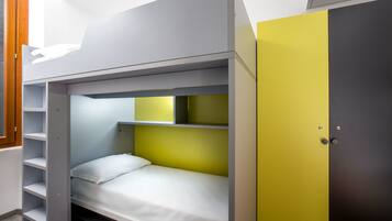 A bunk bed with a white mattress and a yellow headboard.