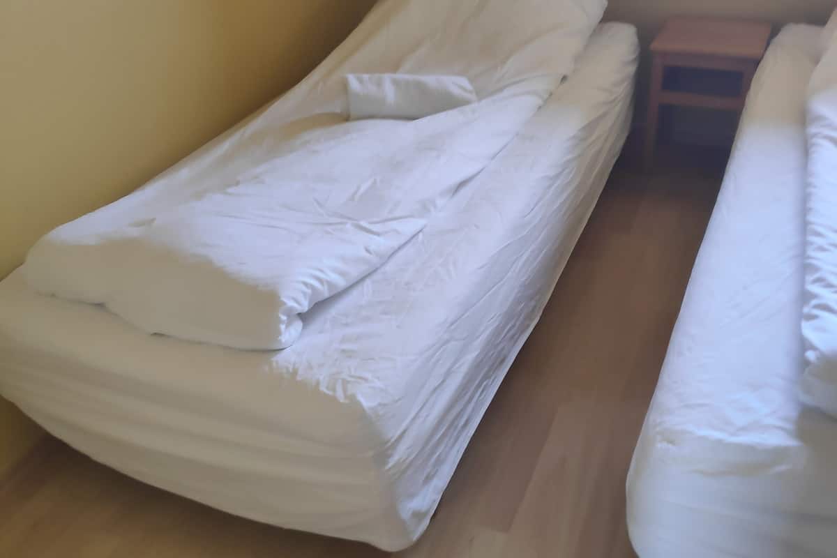 Hypo-allergenic bedding available, laptop workspace, blackout drapes