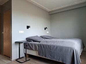 Comfort kamer, 1 twee- of 2 eenpersoonsbedden | Hypoallergeen beddengoed, verduisterende gordijnen, beddengoed