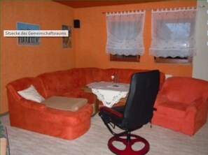 Habitación doble | Área de sala de estar