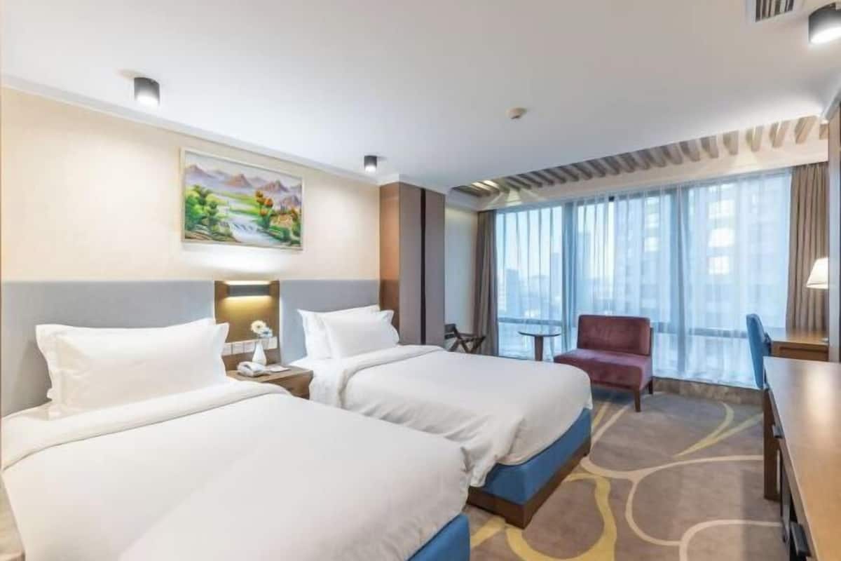 In-room safe, desk, blackout curtains, iron/ironing board