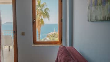 Family Room, Balcony, Sea View | Desk, free WiFi, bed sheets