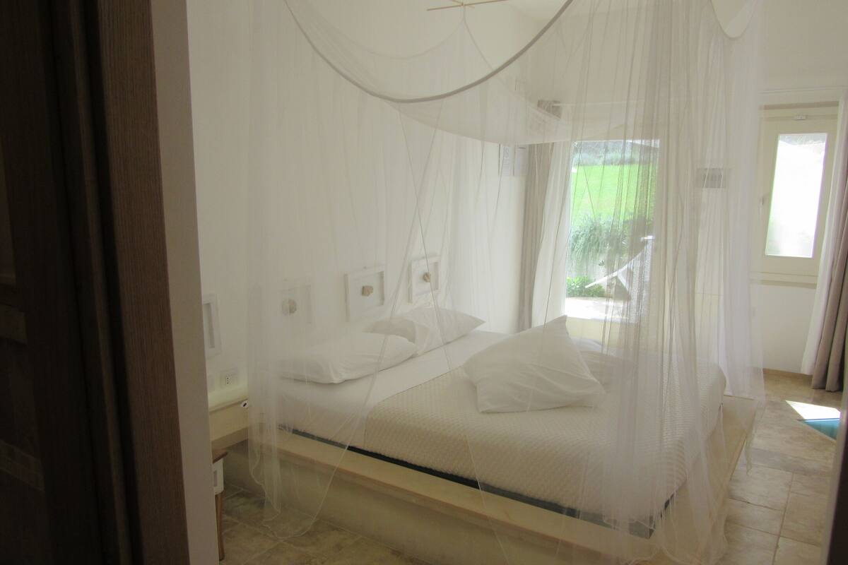 Premium bedding, memory-foam beds, minibar, in-room safe