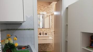 Appartamento Deluxe, vista città | Soggiorno | TV a schermo piatto