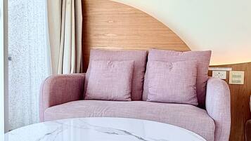 Comfort Double Room | Living area | 50-inch flat-screen TV with digital channels, TV, pay films