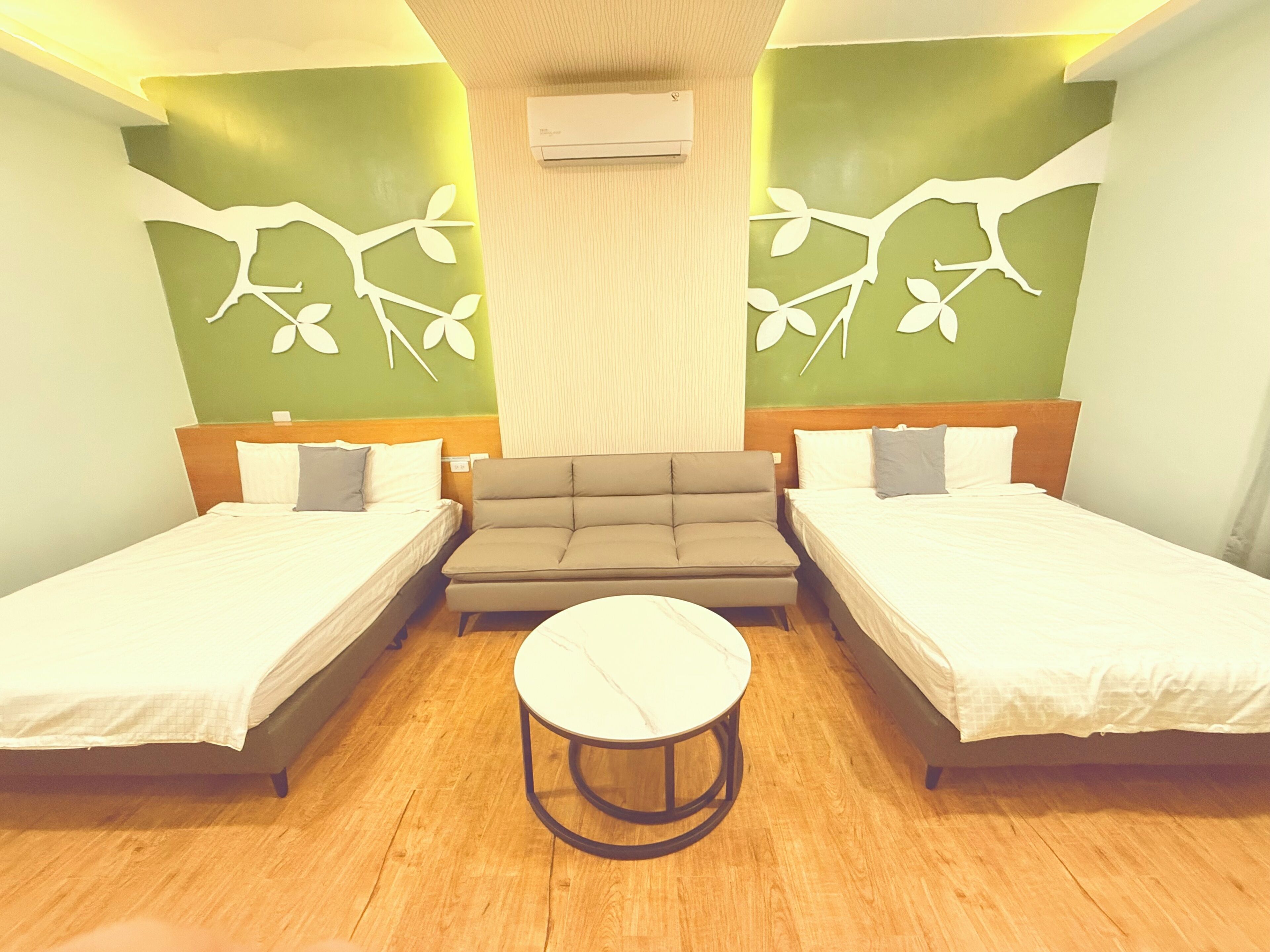 Deluxe Quadruple Room | Minibar, blackout drapes, soundproofing, free WiFi