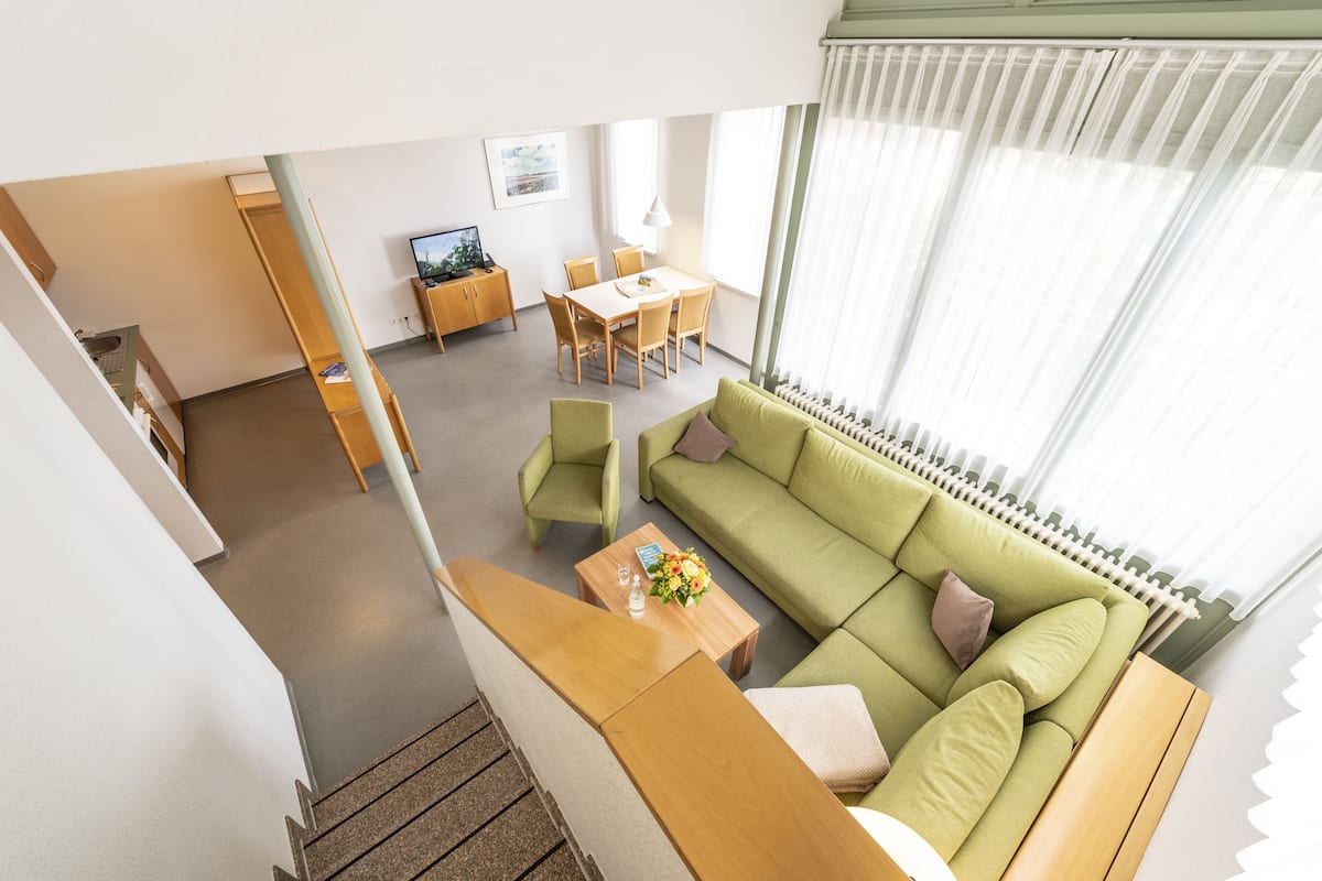 Apartment, 3 Bedrooms | Living area | Flat-screen TV