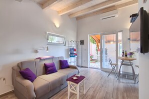 Studio Design, patio, côté jardin | Salle de séjour