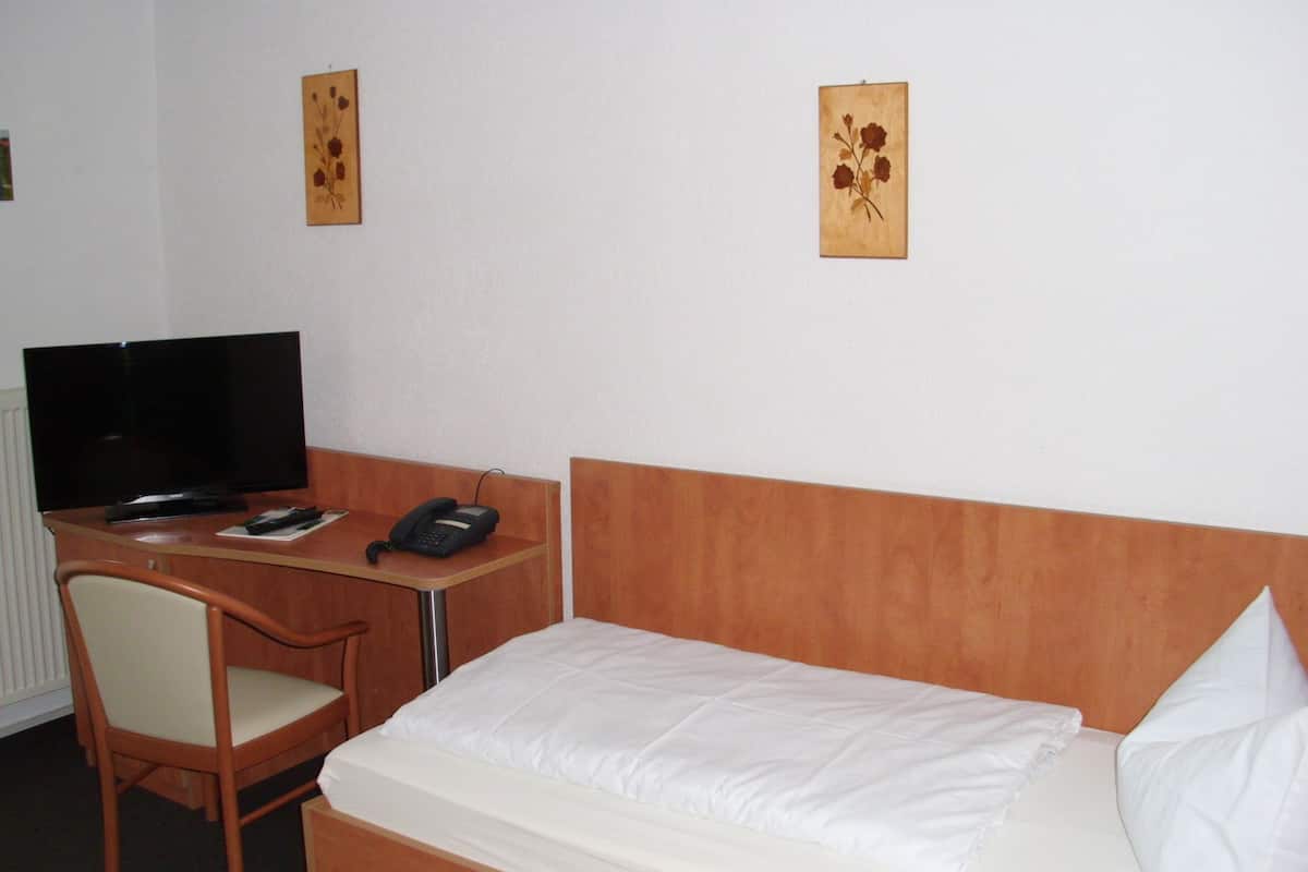 Desk, free WiFi, bed sheets
