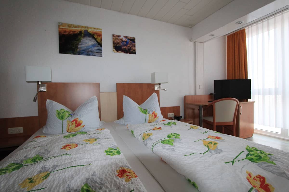 Desk, free WiFi, bed sheets