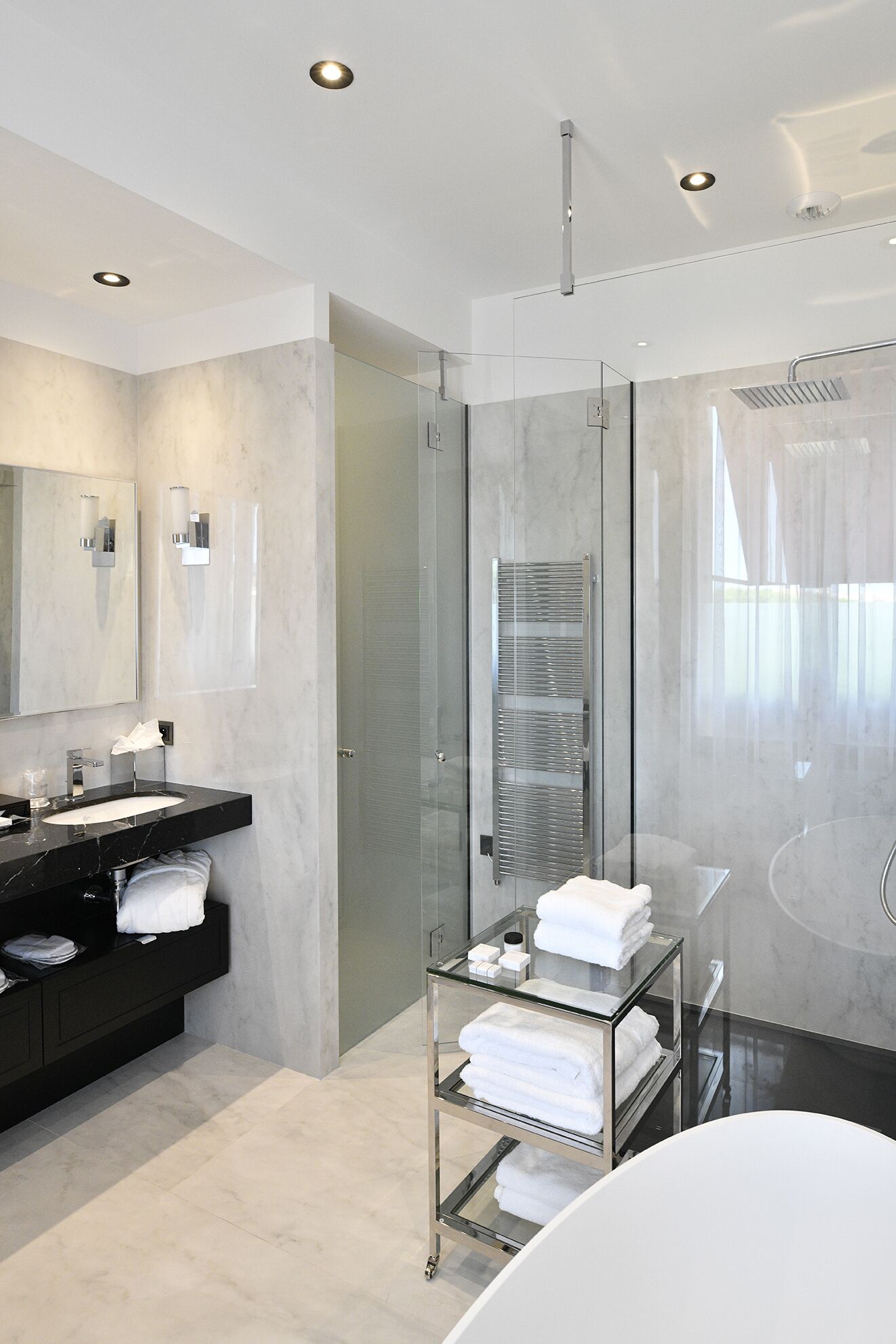 deluxe room | bathroom | designer toiletries, hair dryer, bathrobes, slippers