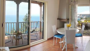 Comfort Villa, 3 Bedrooms (Spiaggia Dorata) | Living room | Flat-screen TV, DVD player