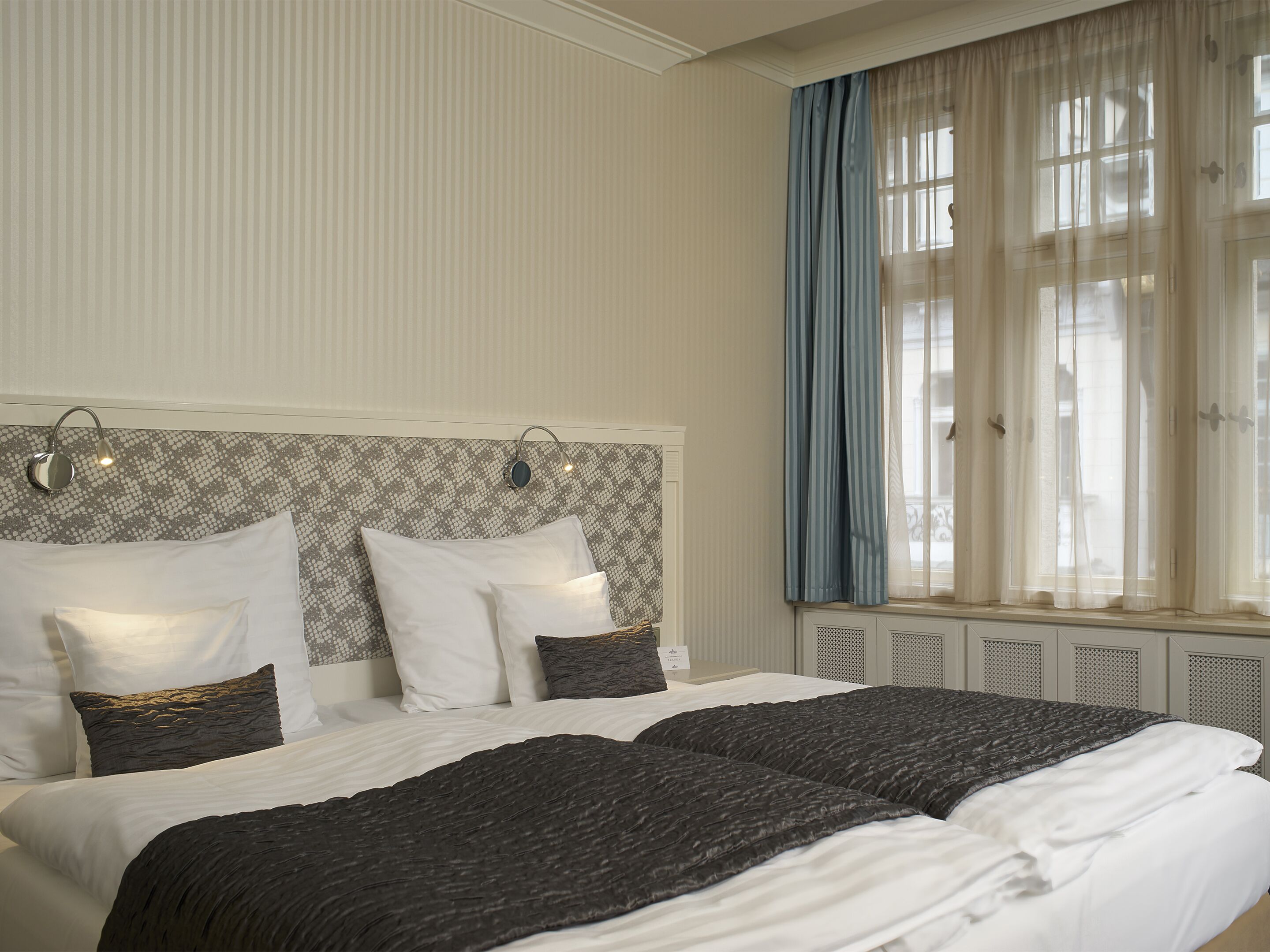 deluxe double or twin room, balcony | in-room safe, blackout curtains, iron/ironing board