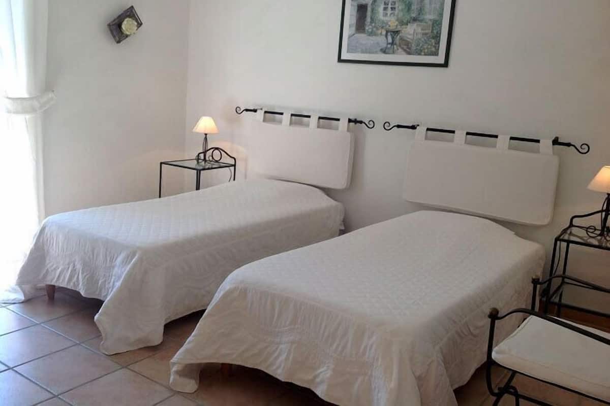 Family Suite, 2 Bedrooms, Pool View | 2 bedrooms, individually decorated, individually furnished