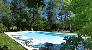 Seasonal outdoor pool, pool loungers