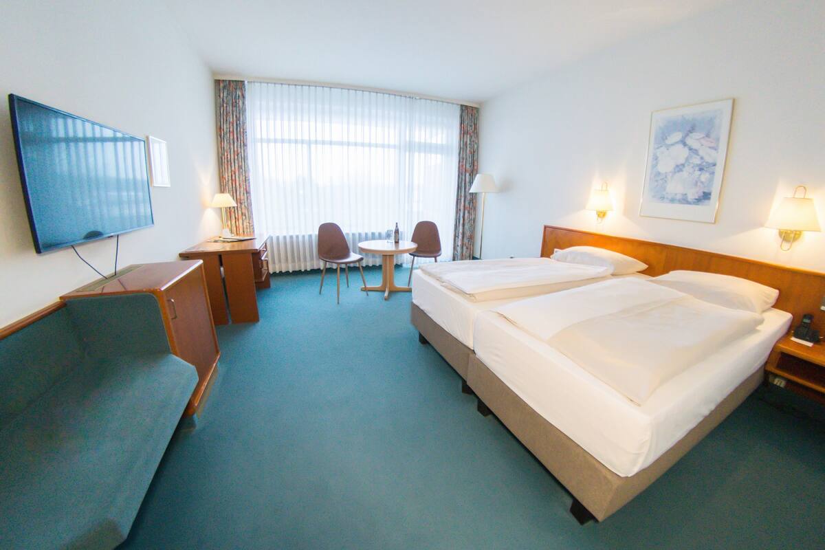 Desk, blackout curtains, free WiFi, bed sheets
