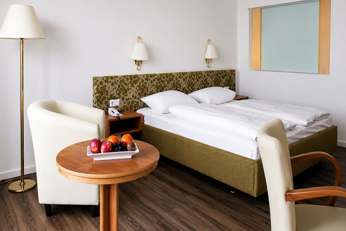 Desk, blackout curtains, free WiFi, bed sheets