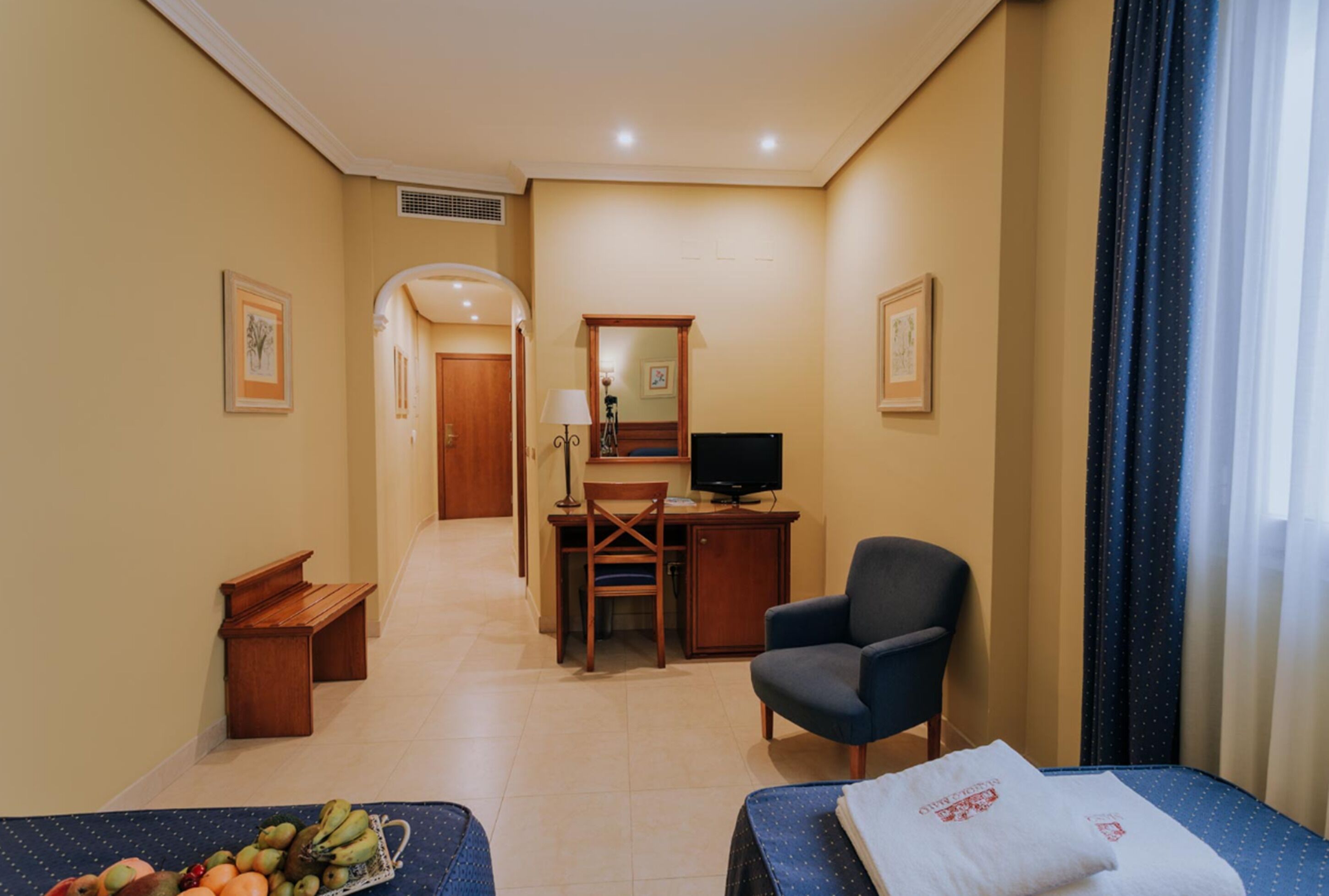 twin room | minibar, in-room safe, desk, laptop workspace