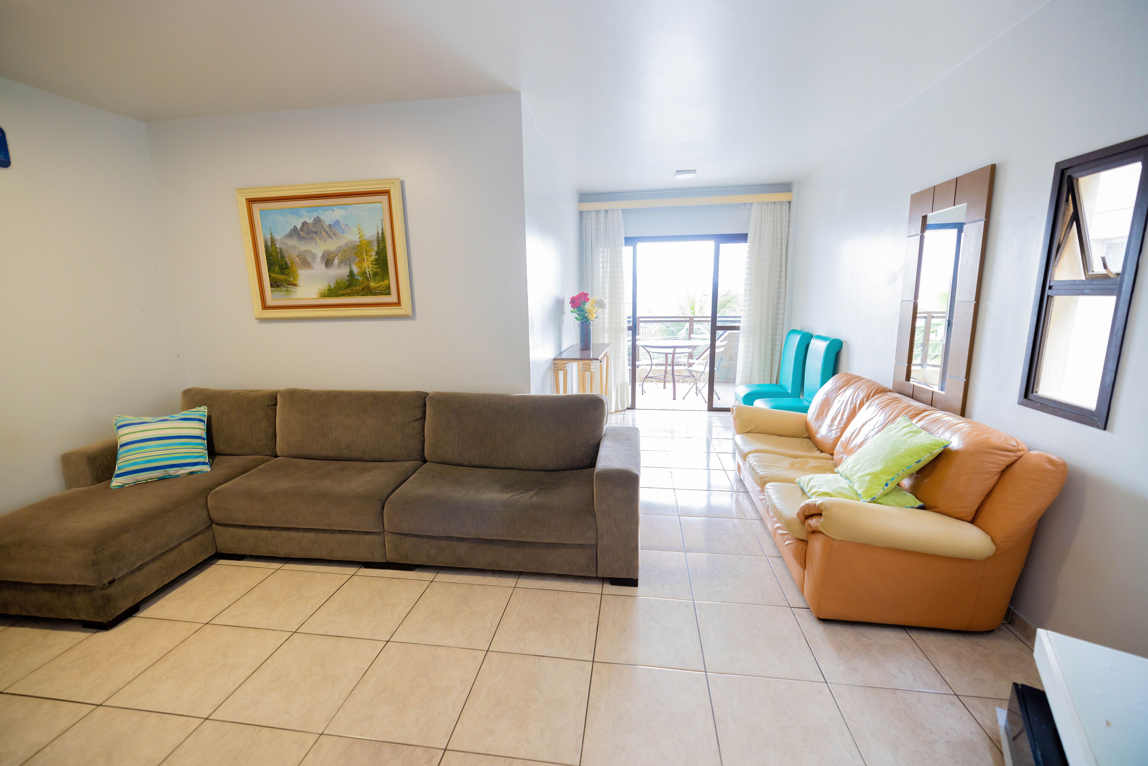 Apartamento família | Área de estar | TV de tela plana