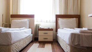 Desk, free WiFi, bed sheets