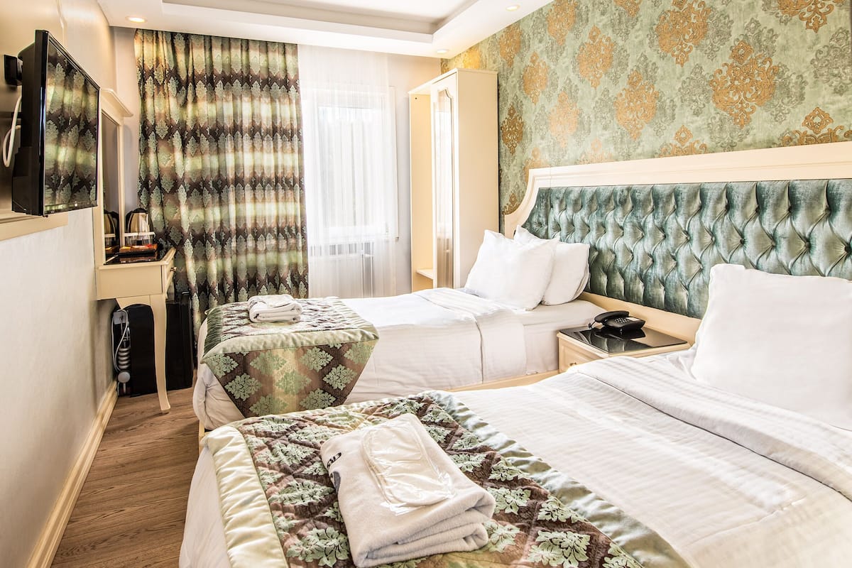 Habitación estándar con 2 camas individuales | 1 habitación, sábanas de algodón egipcio y ropa de cama de alta calidad