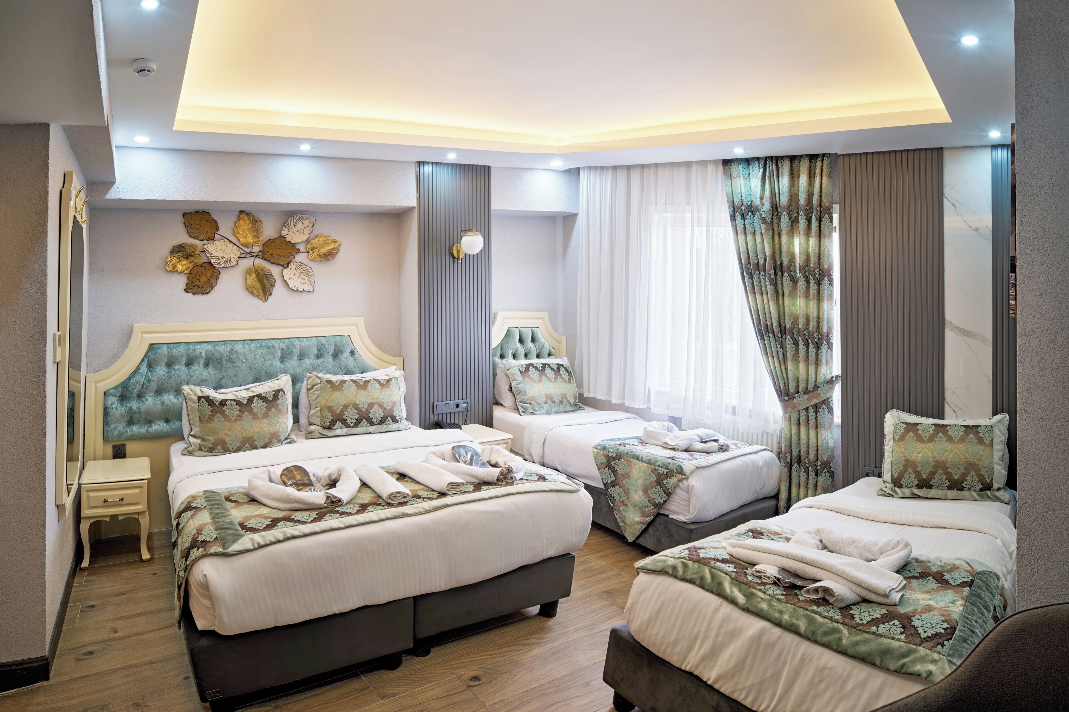 Kamar Quadruple Keluarga | 1 kamar tidur, seprai katun Mesir, seprai premium, dan minibar