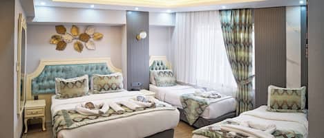 Family Quadruple Room | 1 bedroom, Egyptian cotton sheets, premium bedding, minibar