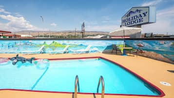 Seasonal outdoor pool, open 7:30 AM to 11:30 PM, pool umbrellas