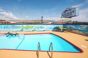 Seasonal outdoor pool, open 7:30 AM to 11:30 PM, pool umbrellas