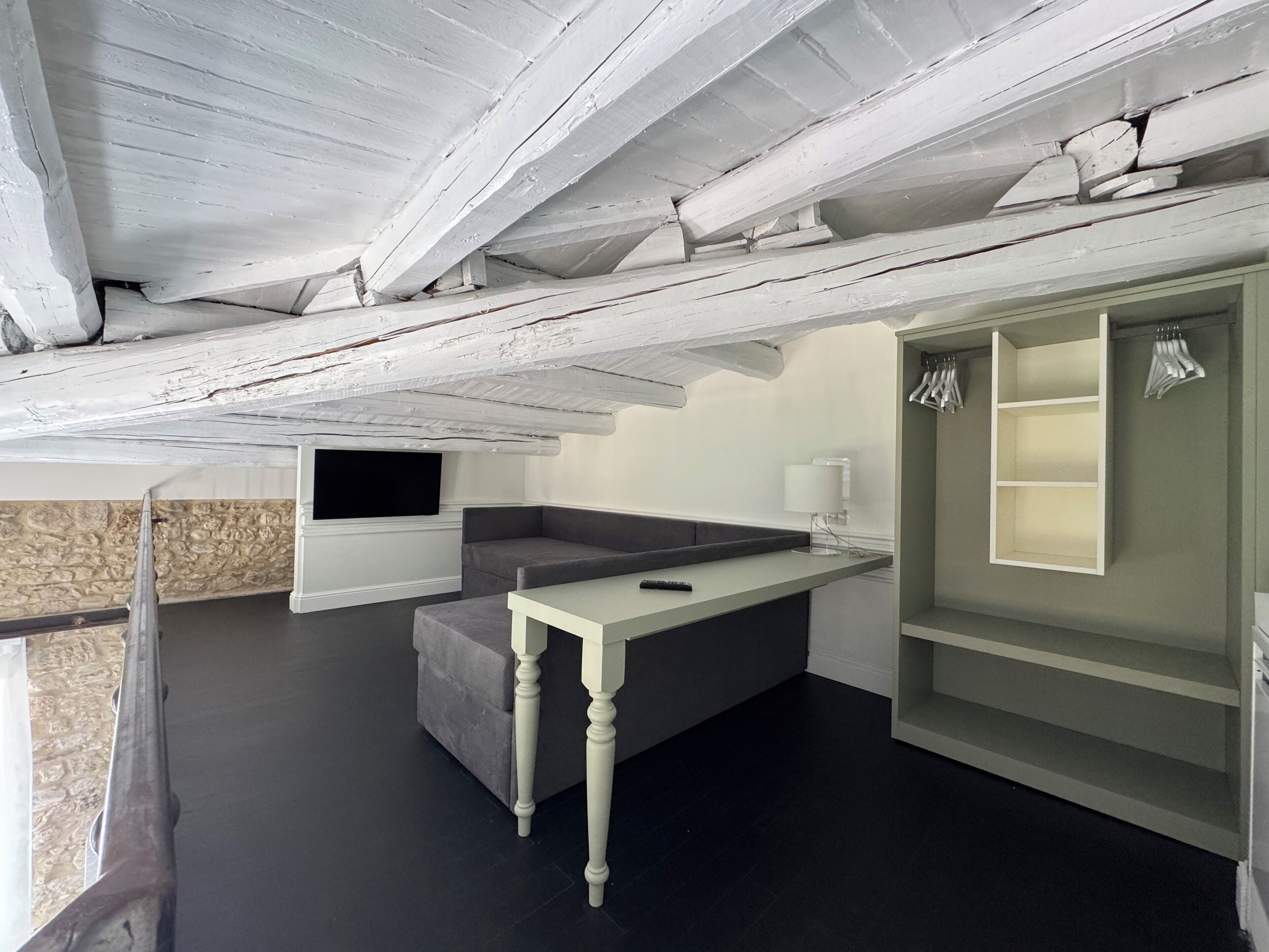 Junior Studio Suite | Living area | 55-inch flat-screen TV with cable channels, TV, Netflix