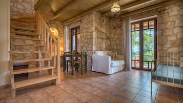 Deluxe Duplex, Patio, Partial Sea View | Living room | 14-inch TV with digital channels, DVD player