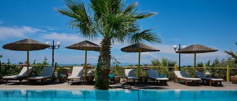 2 outdoor pools, pool umbrellas, sun loungers