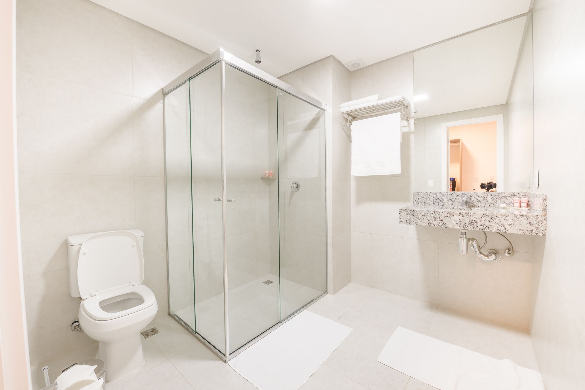 shower, free toiletries, hair dryer, towels