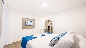 Minibar, desk, blackout curtains, iron/ironing board