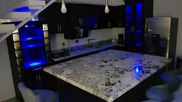 Deluxe House, 2 Bedrooms | Private kitchen | Full-sized fridge, microwave, stovetop, coffee/tea maker