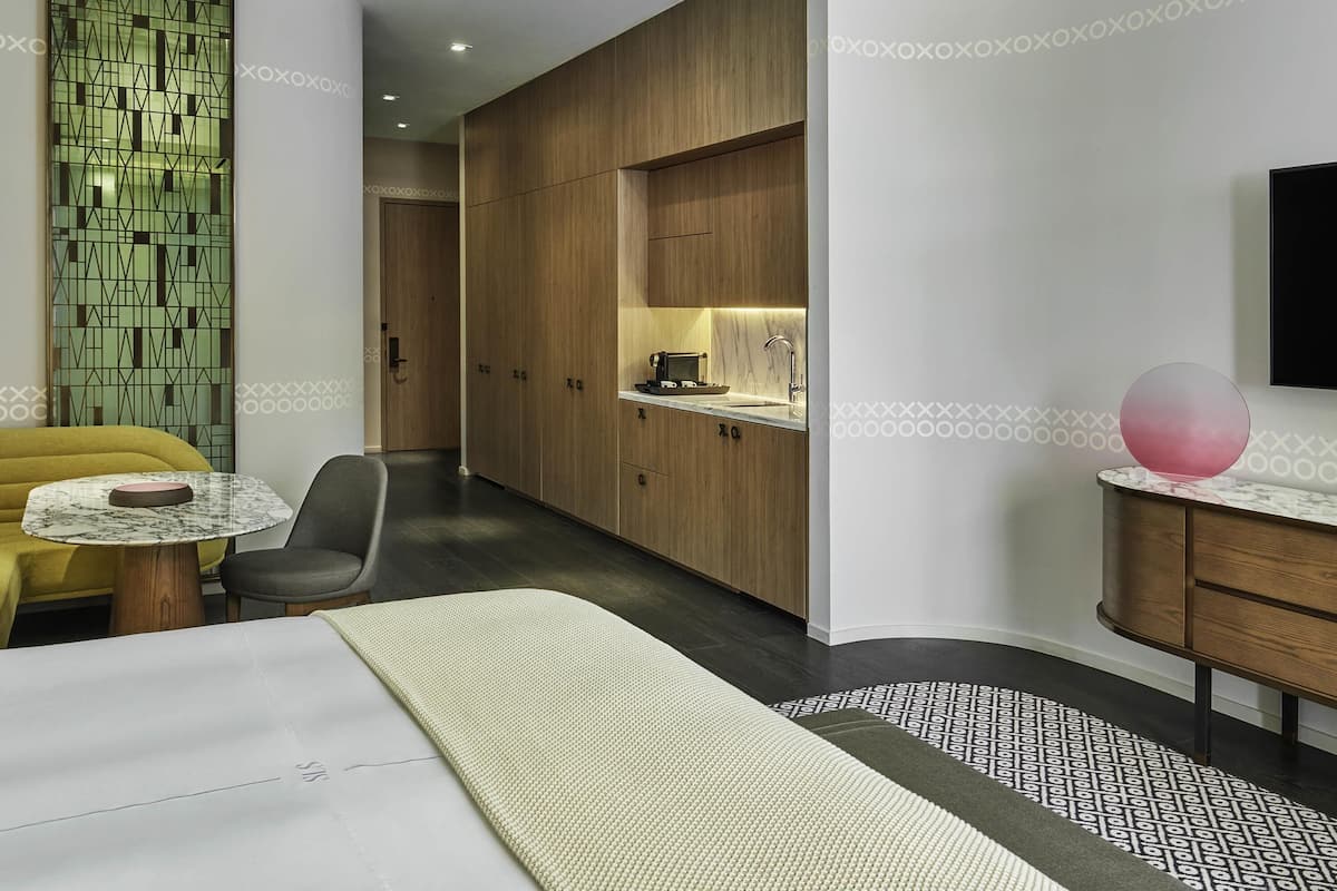 Premium bedding, minibar, in-room safe, laptop workspace