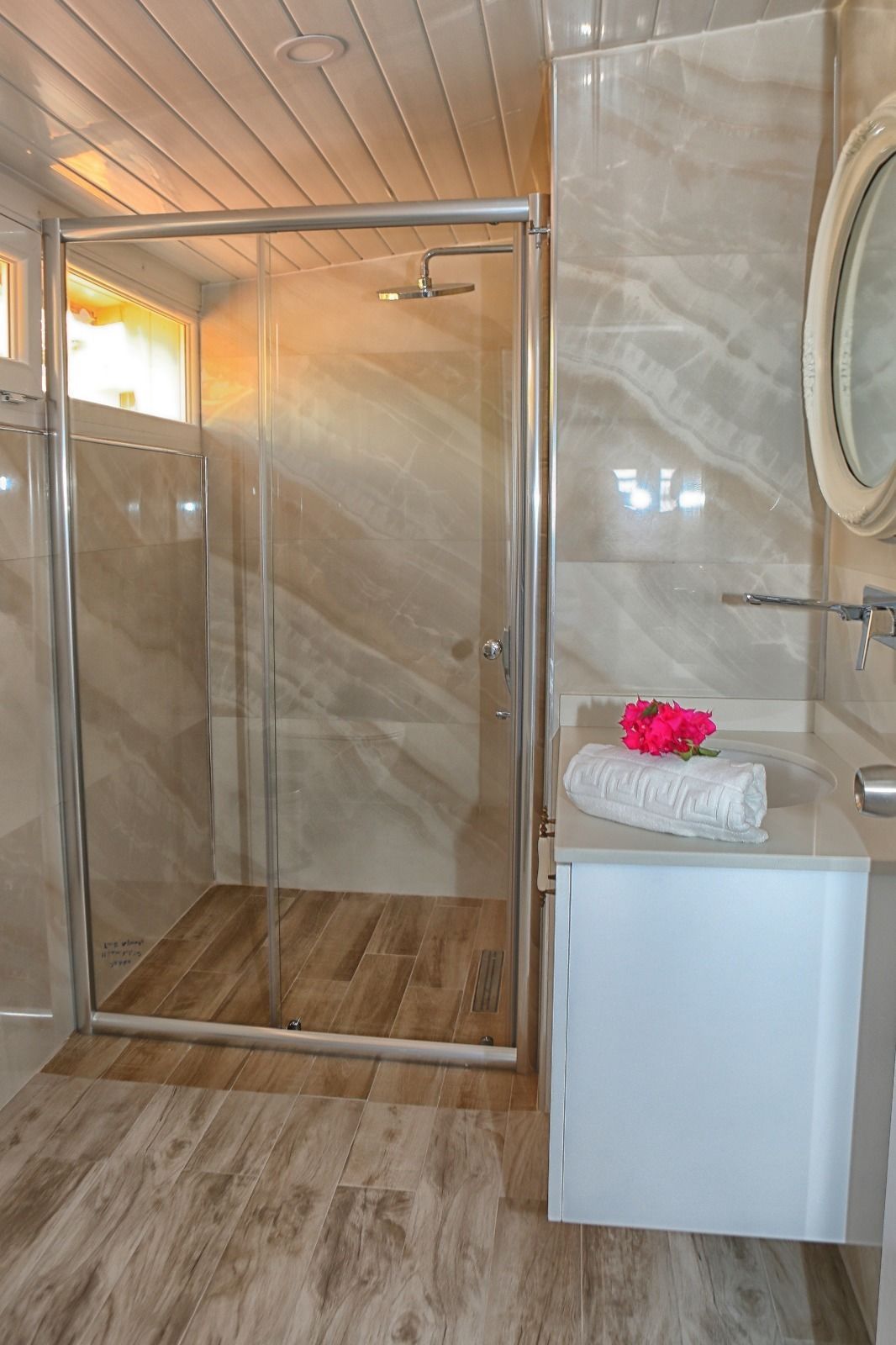 shower, rainfall showerhead, hair dryer, slippers