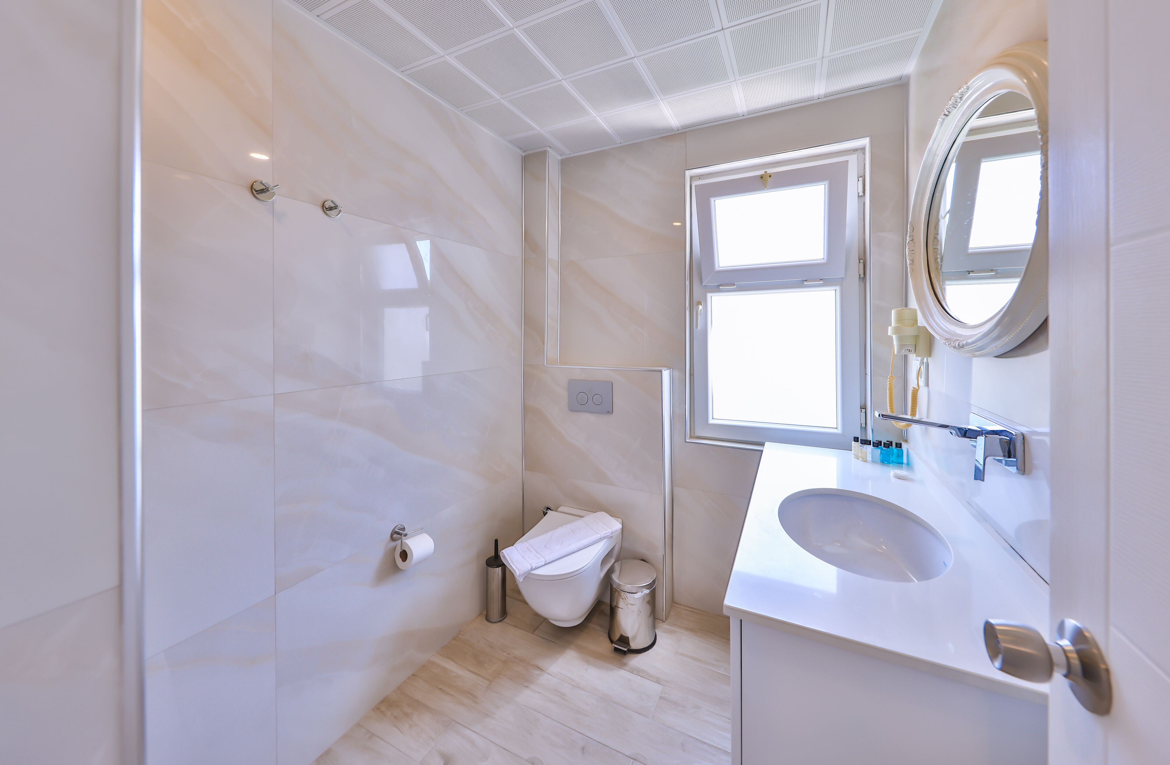 standard triple room | bathroom | shower, rainfall showerhead, hair dryer, slippers