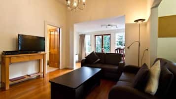 Villa, 2 Bedrooms, Garden View | Living area | Flat-screen TV, fireplace, DVD player