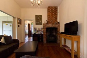 Villa, 2 Bedrooms, Garden View | Living room | Flat-screen TV, fireplace, DVD player - Christchurch City & Country Cottages - Brockworth Cottage (Christchurch)
