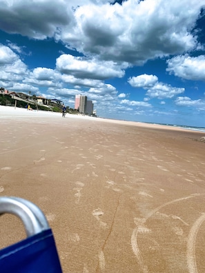 On the beach, sun loungers, beach towels